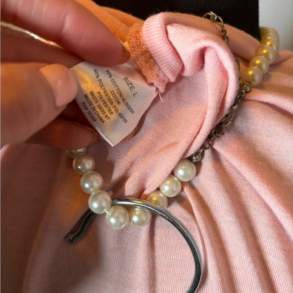 Sold Pink pajamas with peace and happy signs. New. 21” ptp 26” shoulder to hem - Picture 3 of 3